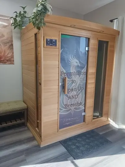 The private salt booth at AND Wellness, with a door that reads Permission to Open Up AND Breathe